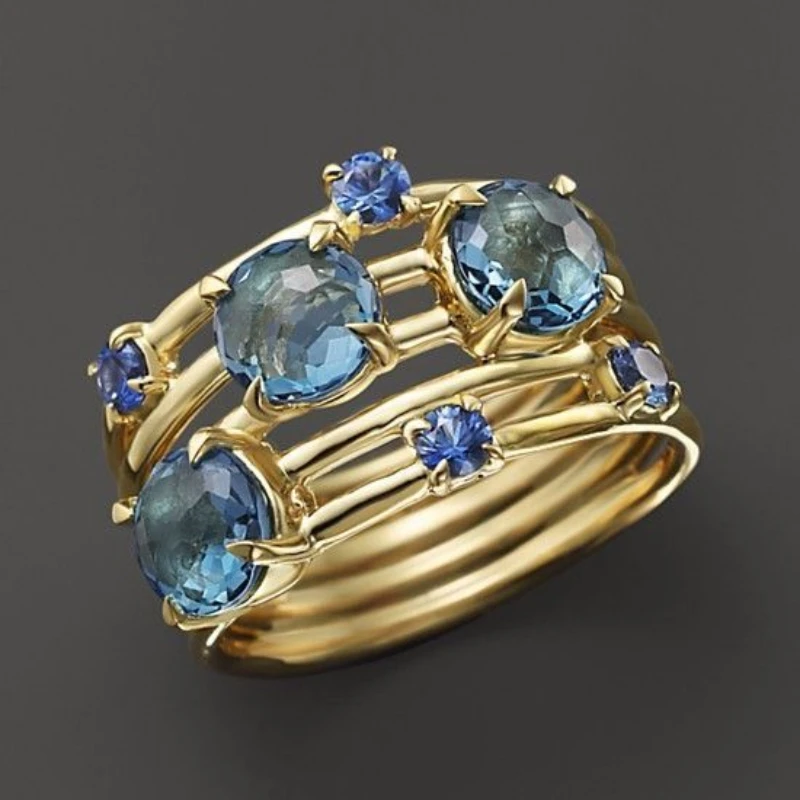Image of Luxuriöser Mehrschichtiger Ring mit Blauen Synthetischen Edelsteinen aus Kupfermaterial für Damen, Schmuckring für Festliche Anlässe
