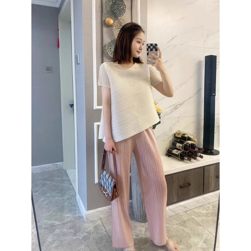 Miyake T-shirt plissé irrégulier couleur unie haut plissé haut de gamme à manches courtes 2025 été nouveau longueur ample mince T-shirt femmes