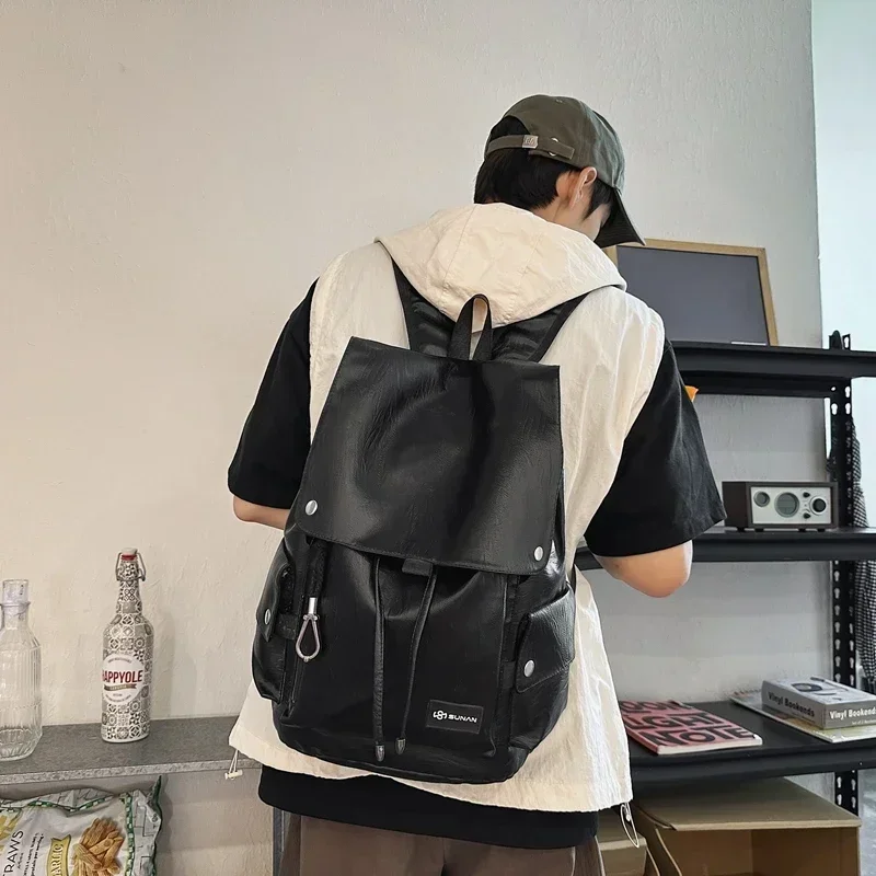 Mochila de estilo versátil de gran capacidad de ocio de PU, nueva cremallera a la moda, bolso de viaje de alta calidad, mochilas escolares de tendencia concisa