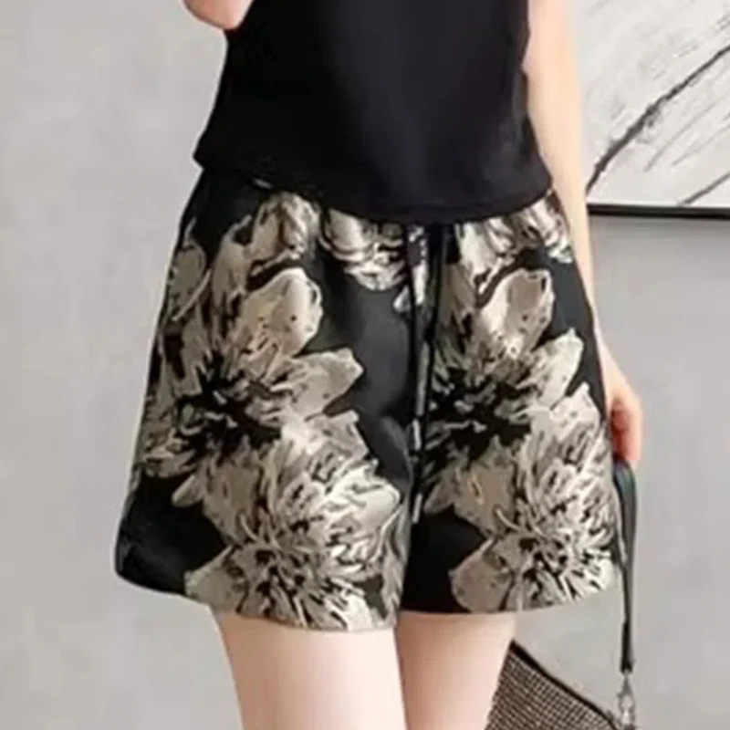 

2024 Summer Women's New Spliced Elasticized High-waisted Drawstring Pocket Printed Fashion Loose Versatile Casual Sports Shorts