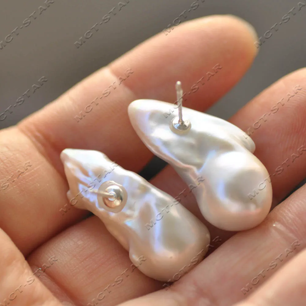 

Серьги-гвоздики MTC·STAR, белые, 32 мм, в стиле барокко, с жемчугом Кеши, серебро 925 пробы (Z14391)