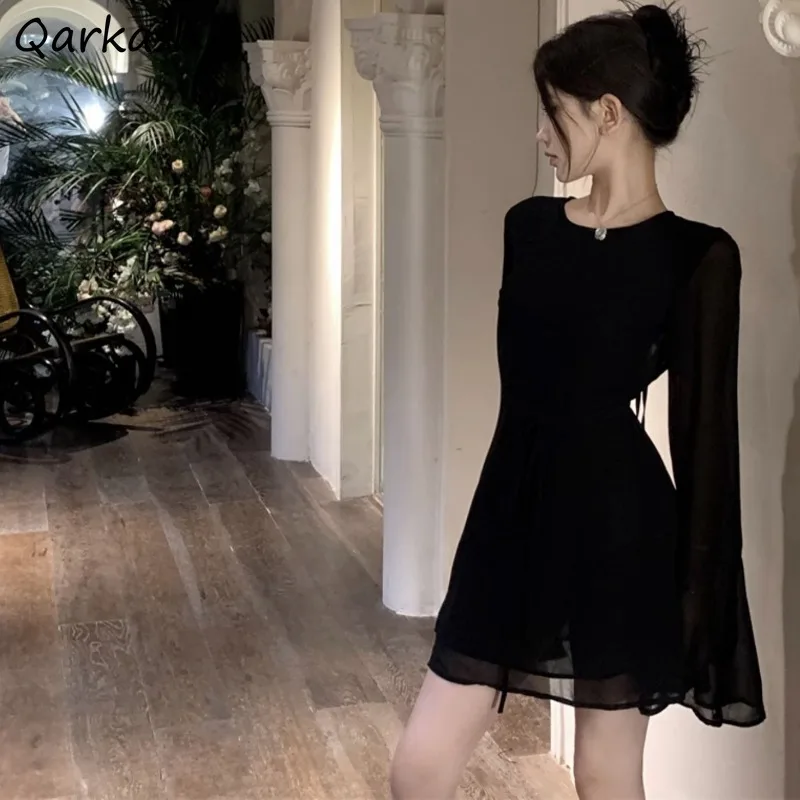 cóctel vestido negro de mangas