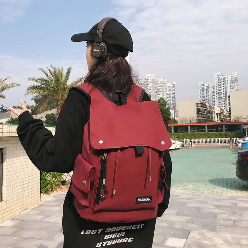 Men's and women's backpacks wholesale anti-splashing locomotive large capacity large cover student schoolbag new backpack