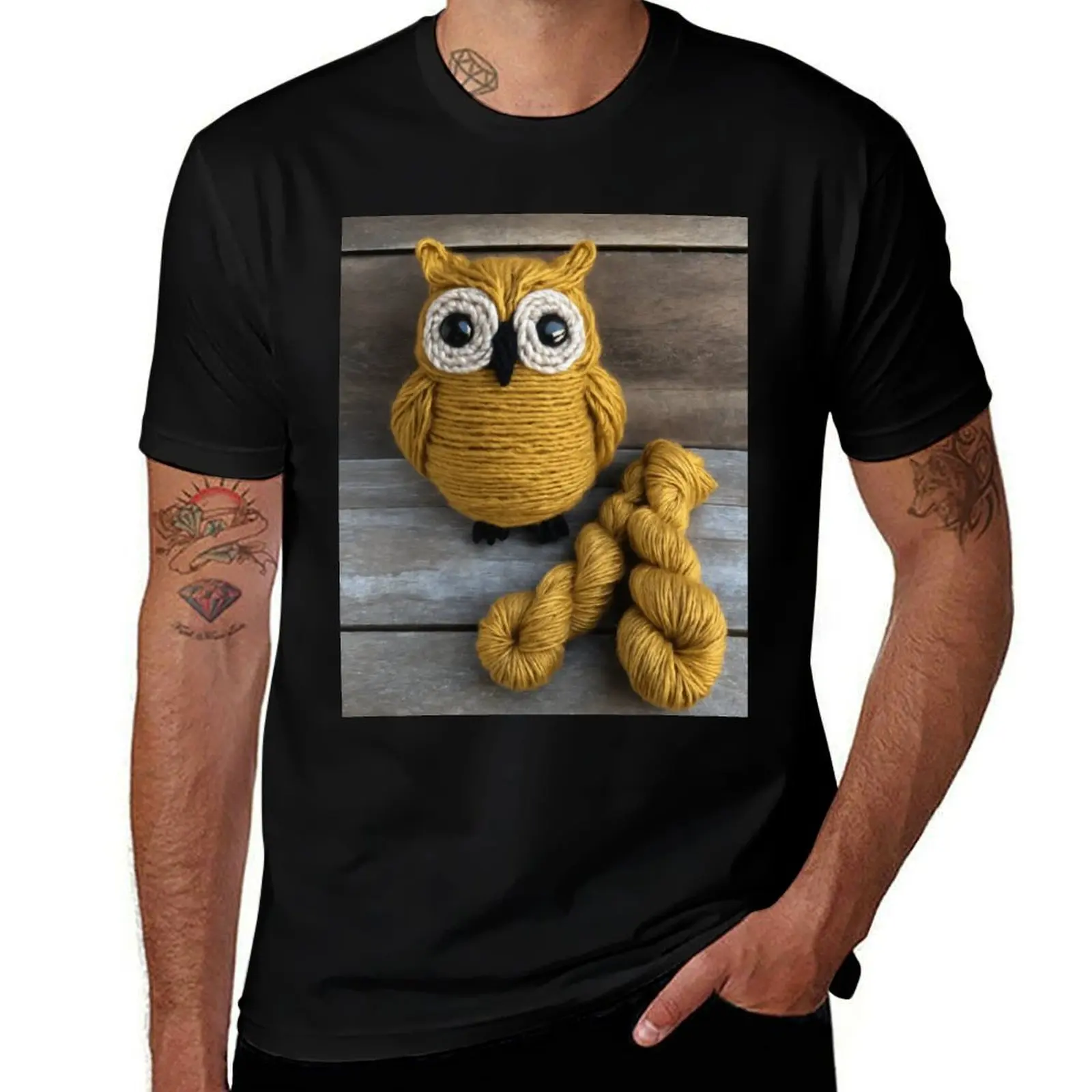 

Crocheted Owl with Yarn on Wood Background T-Shirt new edition blacks Blouse men clothing