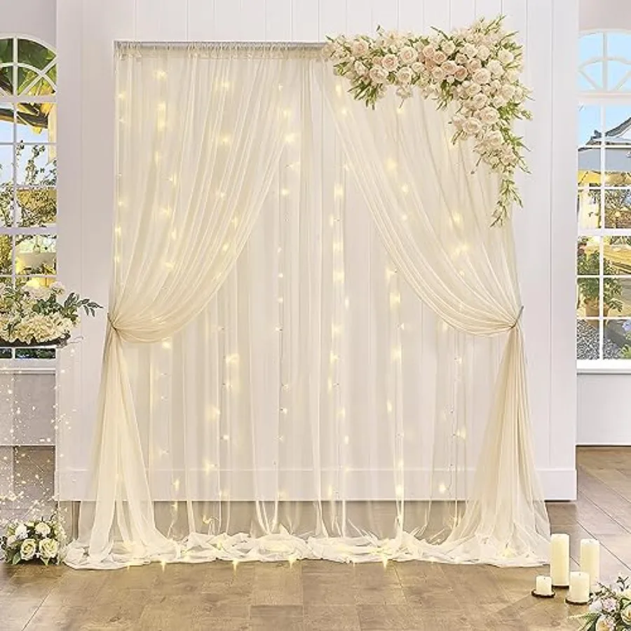 

Party backdrop curtain for weddings and photo shoots, sheer champagne tulle, 20×10ft with integrated light string, 4 panels 5ft