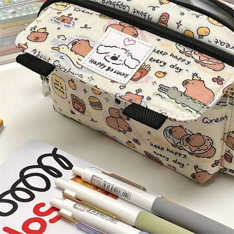Estuches para lápices con tapa de capibara, estuche para lápices de dibujos animados a la moda, bolsa de almacenamiento de papelería Kawaii, bolsas de cosméticos, monedero
