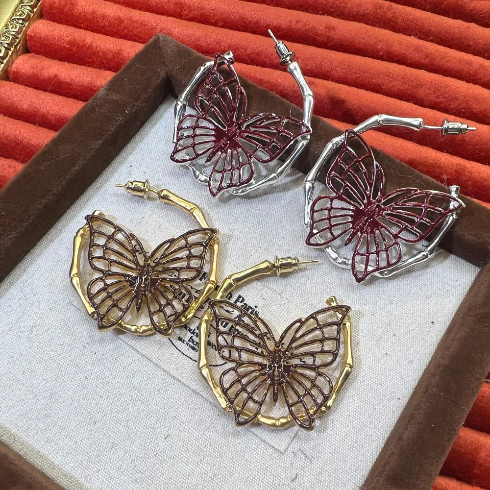 Korean hollow hand-painted enamel butterfly earrings, niche design versatile light luxury retro court style S925 earrings