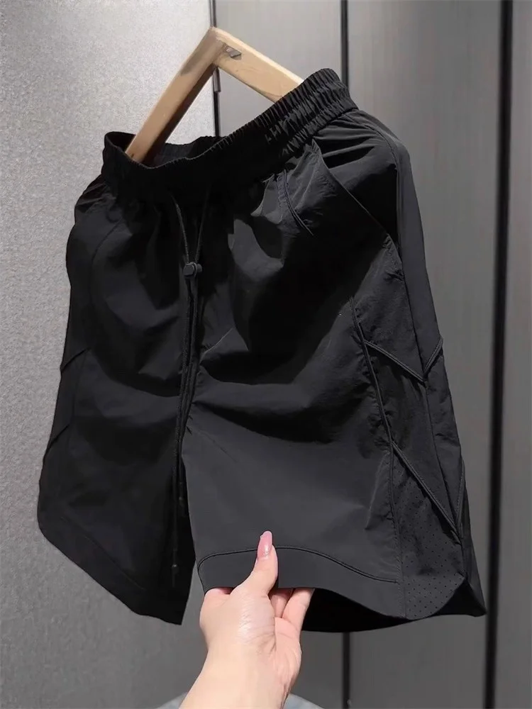 

Мужские летние тонкие свободные шорты из высококачественного ледяного шелка, быстросохнущие, повседневные, модные, из полиэфирного волокна, длиной до колена.