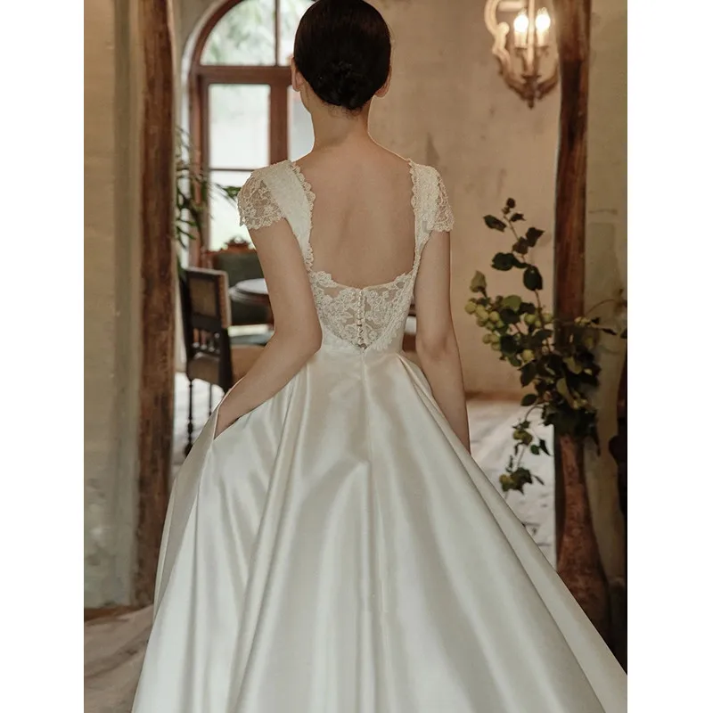 2022 New Design Elegant Boat Neck Wedding Dress Cap Sleeves Soft Satin Korean Vintage A-Line Simple Backless Bridal Gowns 웨딩드레스