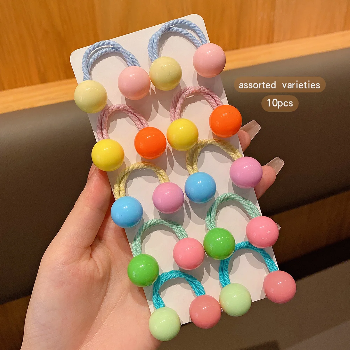 10 button style double ended rubber bands with colorful random hair loops suitable for daily use as hair accessories