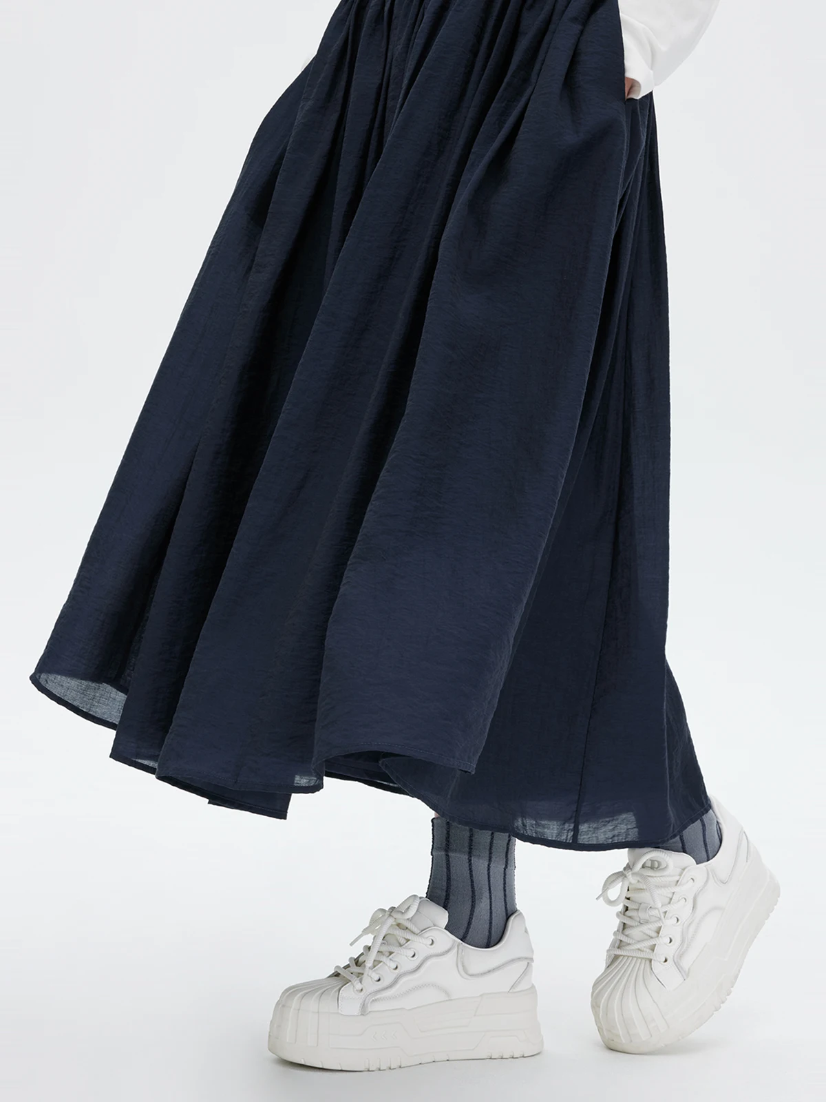 Wiosenno-jesienna nowa damska spódnica do połowy łydki, modna spódnica do pracy z wysokim stanem, ciemnoniebieska, rozkloszowana, długa.