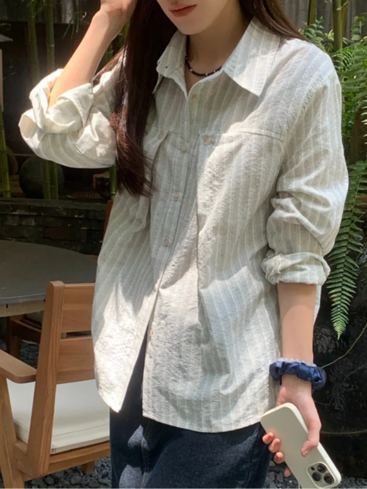 เสื้อสตรีลายทางแฟชั่น ดีไซน์โดดเด่น กระดุมเดี่ยว แขนยาว สไตล์หรูหรา เหมาะสำหรับใส่ทำงาน ฤดูใบไม้ผลิและฤดูใบไม้ร่วง