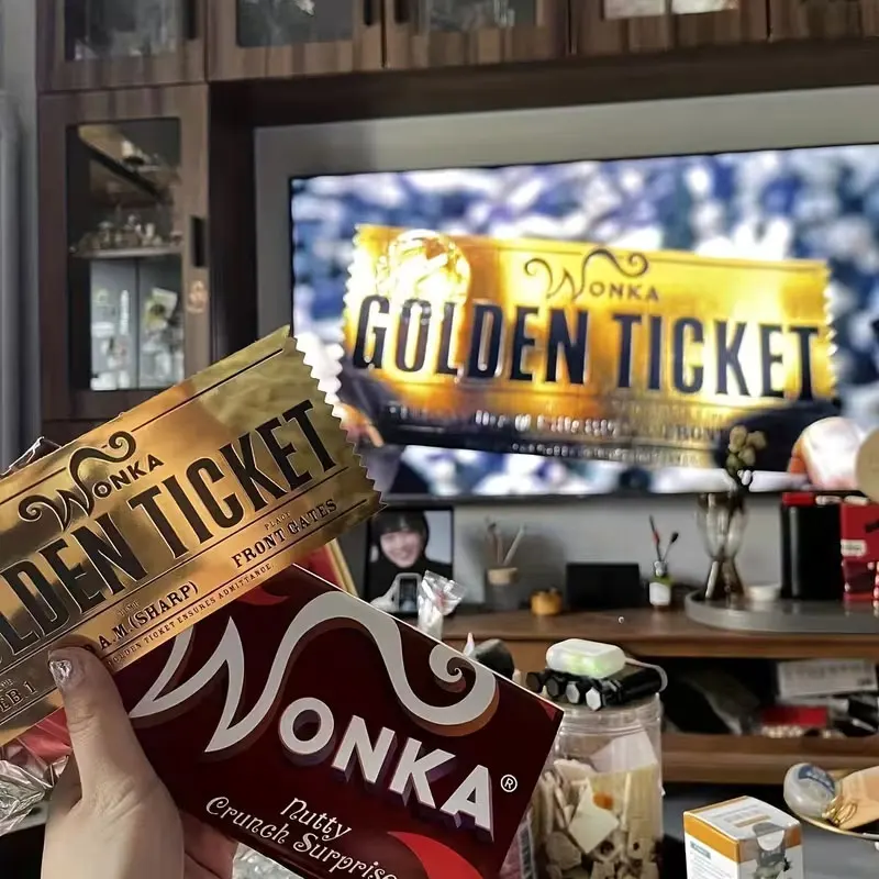 1 Piece of Wb Wonka Chocolate Factory Gold Ticket - Vintage Movie Souvenir Collector's Item, Designed with &Charlie's Gold Ticket Design, Authentic Replica for Collection and Display - Perfect Gift for Wonka Fans and Movie Enthusiasts, Movie-Themed Gift, Plush Ticket Design, Brand Identity, Fan Merchandise, Movie Collectibles, Durable Collectibles, Movie Collectors, Movie Enthusiasts