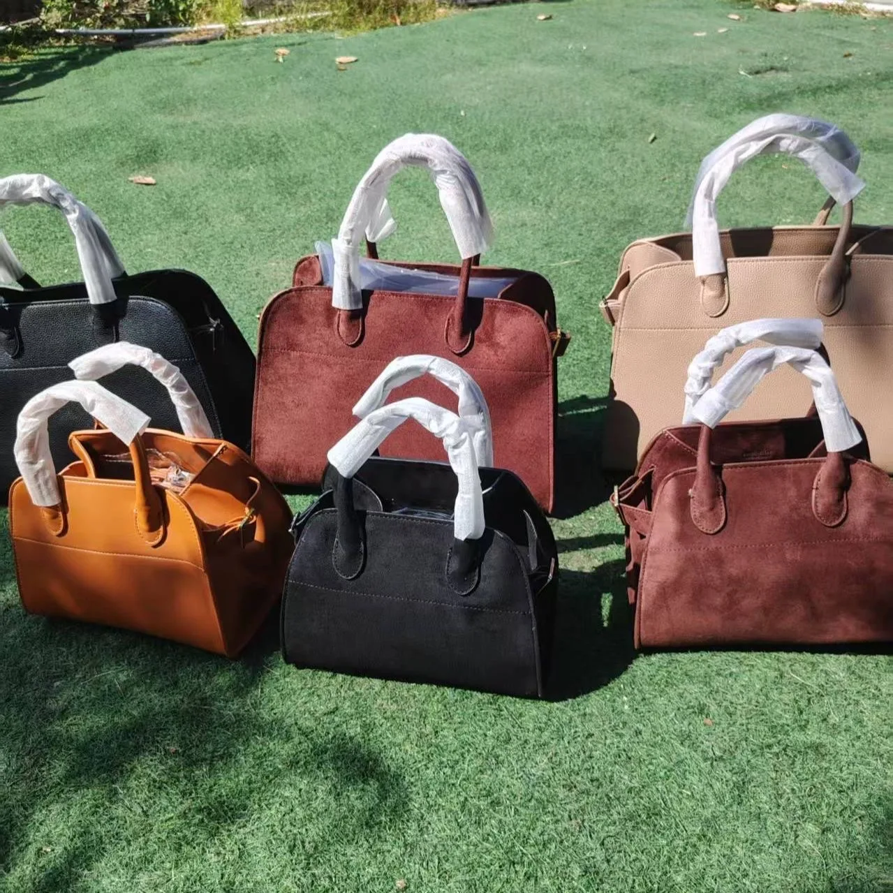 

High-quality designer tote bag made of genuine leather - Margot 15 shoulder/crossbody bag. Margot 10 soft suede tote bag with la