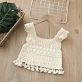 beige vest