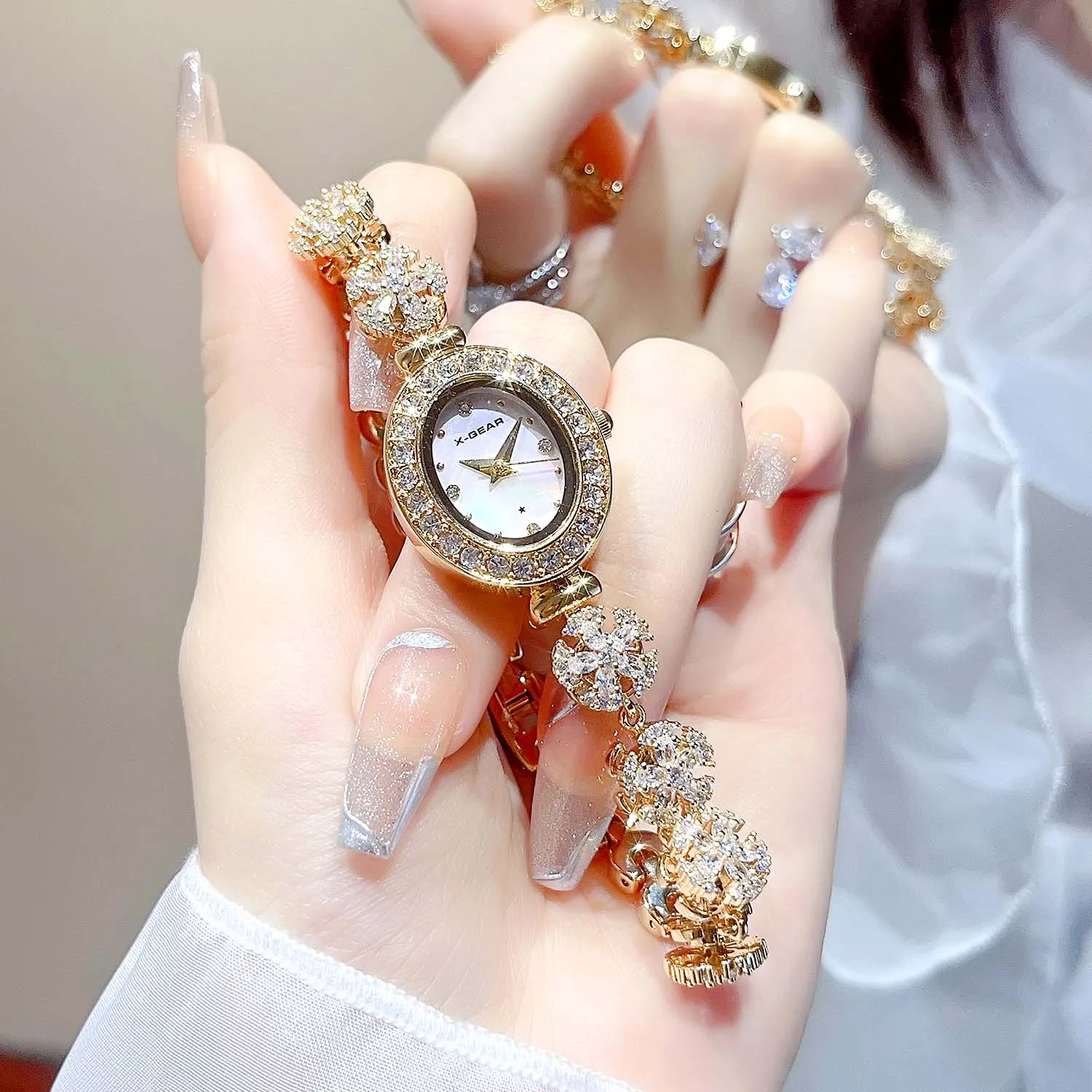 

X-GEAR брендовые женские роскошные часы с вращающимся браслетом из розового золота, темпераментные кварцевые водонепроницаемые часы, модные женские часы с бриллиантами
