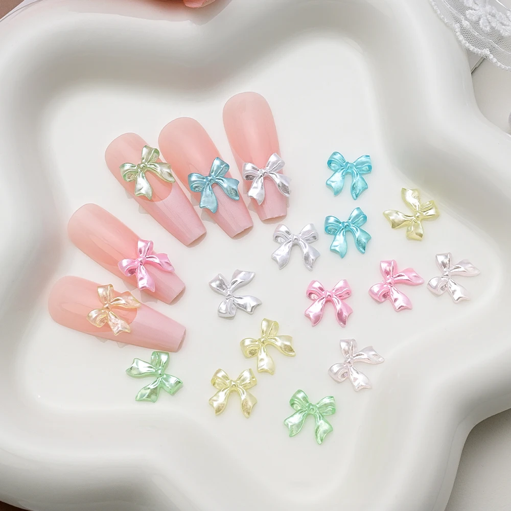 100Pcs 3D Pearl Color Bow-Knot Nail Art Charms Cute Resin Pearl White Ribbon Bow Nail Rhinestones Bow Designs Nail Art Supplies
