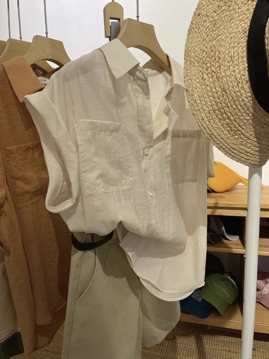 

Guangzhou Thirteenth Factory Women's Micro-transparency Sleeveless Cuffed Collar Shirt Summer Elegance Color Top