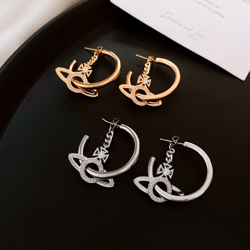 NISHIZAWA Zircon Letter Saturn Earrings Niche Design Earrings