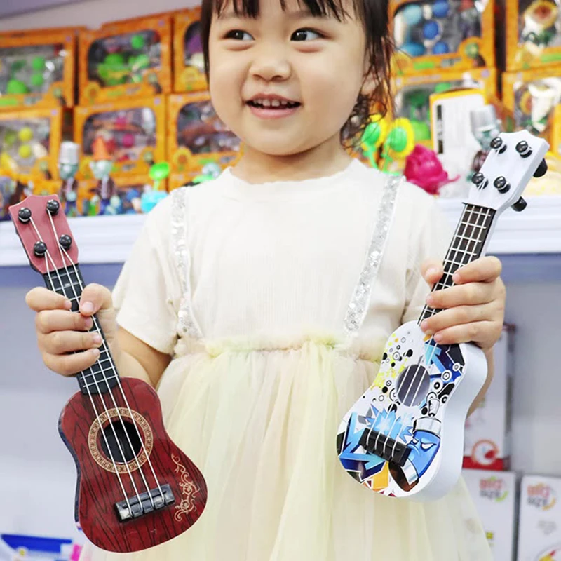 1 szt. 4-strunowa Mini Gitara Instrumenty Muzyczne Prezenty Zabawki Edukacyjne Wczesnoszkolne Dla Początkujących Dzieci Ukulele 21 Calowe