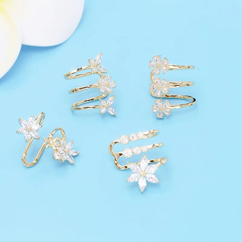 

The niche butterfly flower ear clips without ear holes, the popular female ear studs, simple and elegant, versatile and style