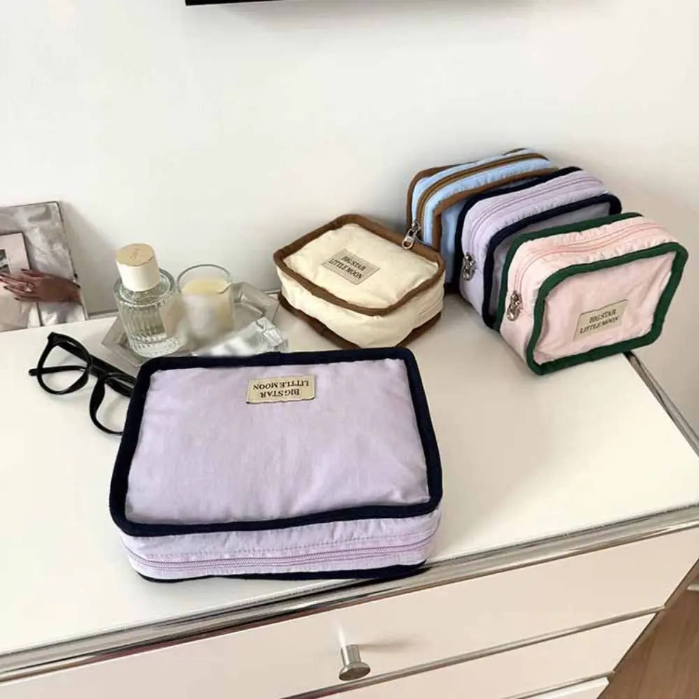 حقيبة مستحضرات التجميل المحمولة ذات الألوان المتباينة على الطراز الكوري بسحاب وحقيبة بلون سادة ومحفظة للعملات المعدنية وحقيبة تخزين المناديل الصحية الناعمة