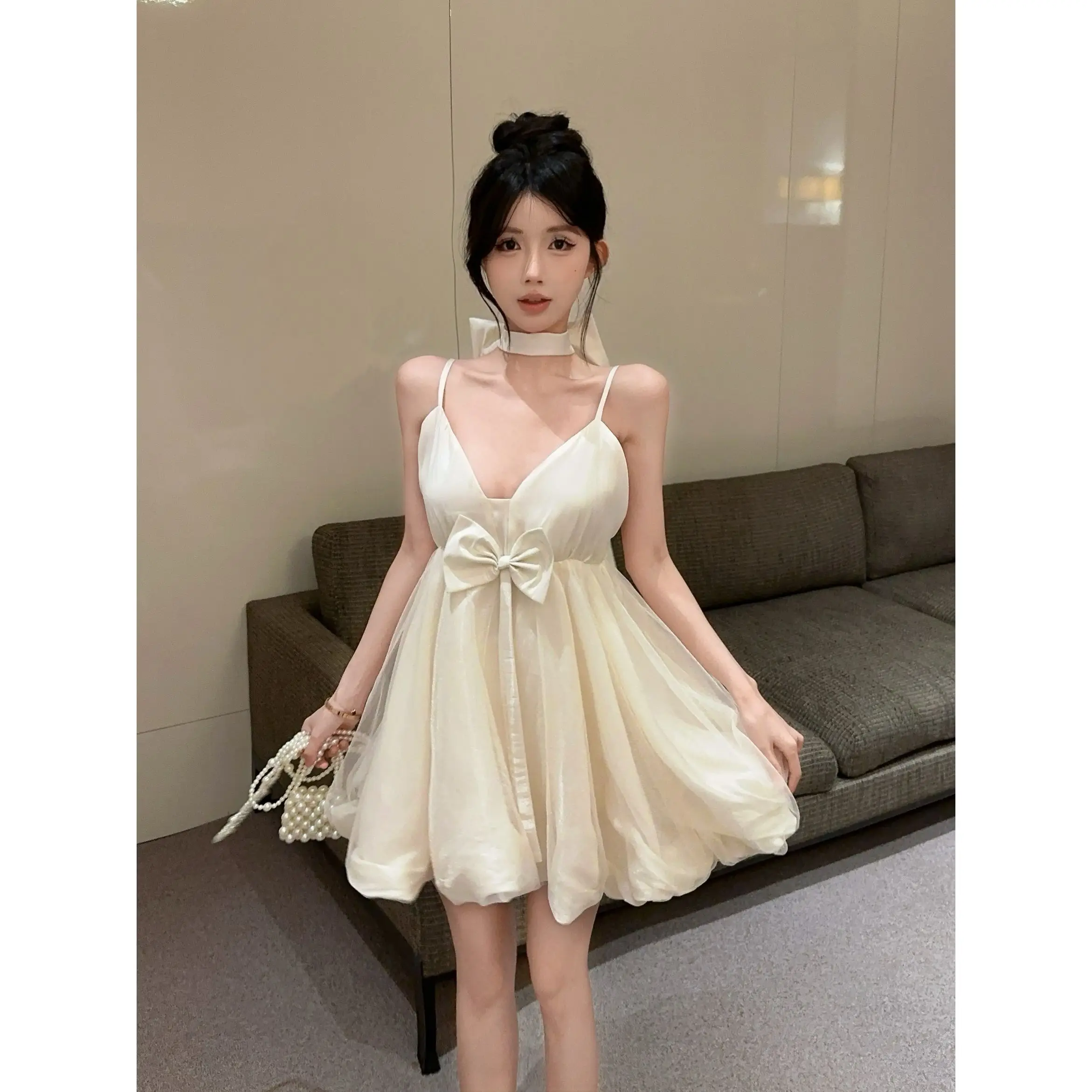 Backless Bowknot 퍼프 드레스 여성 민소매 우아한 공주 스타일 요정 Tulle 미니 드레스 여름 세련된 흰색 패션 의상 새로운