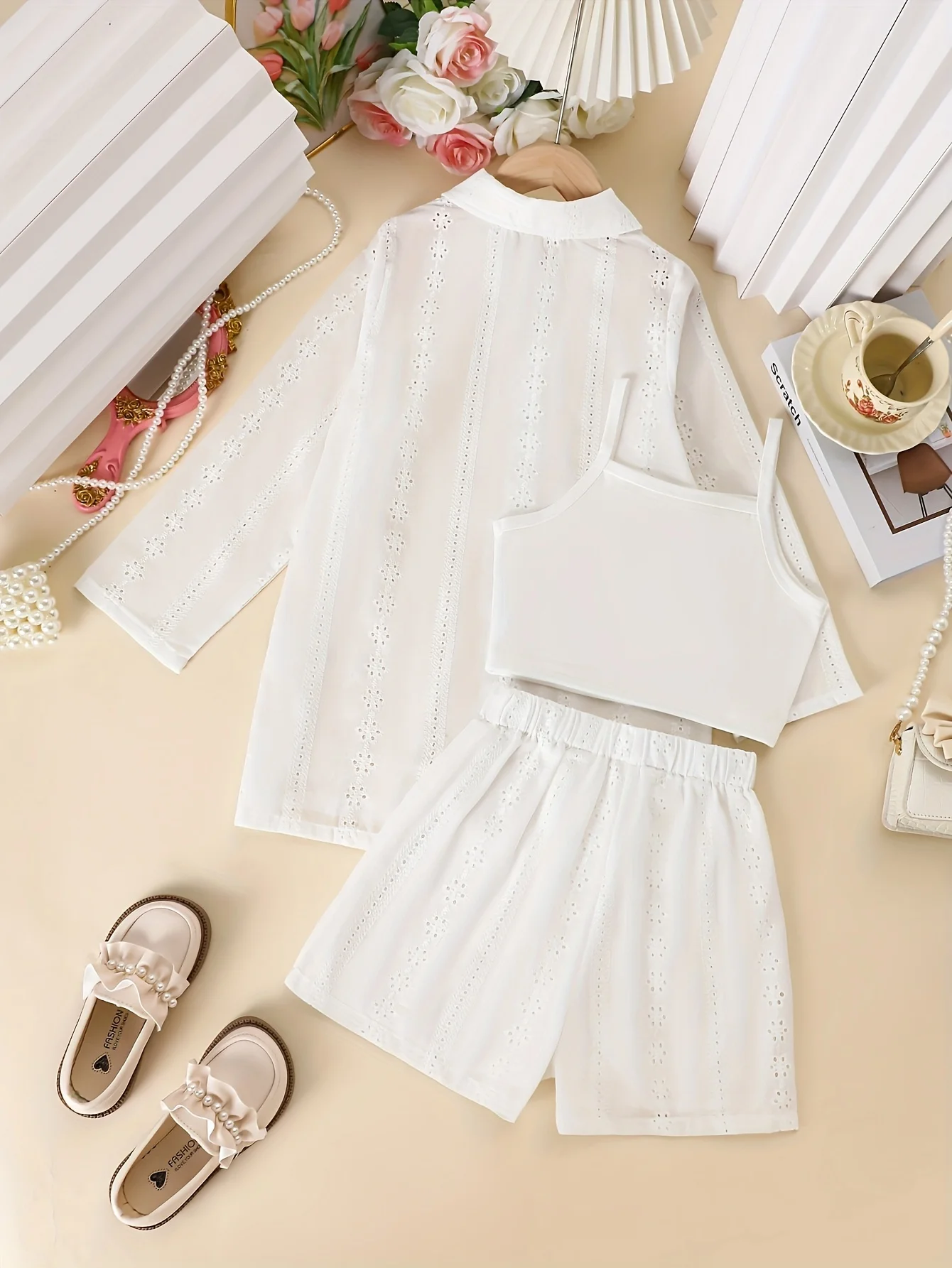 Girls' three piece solid color long sleeved hollow embroidered flower jacket and camisole top shorts for vacation and leisure