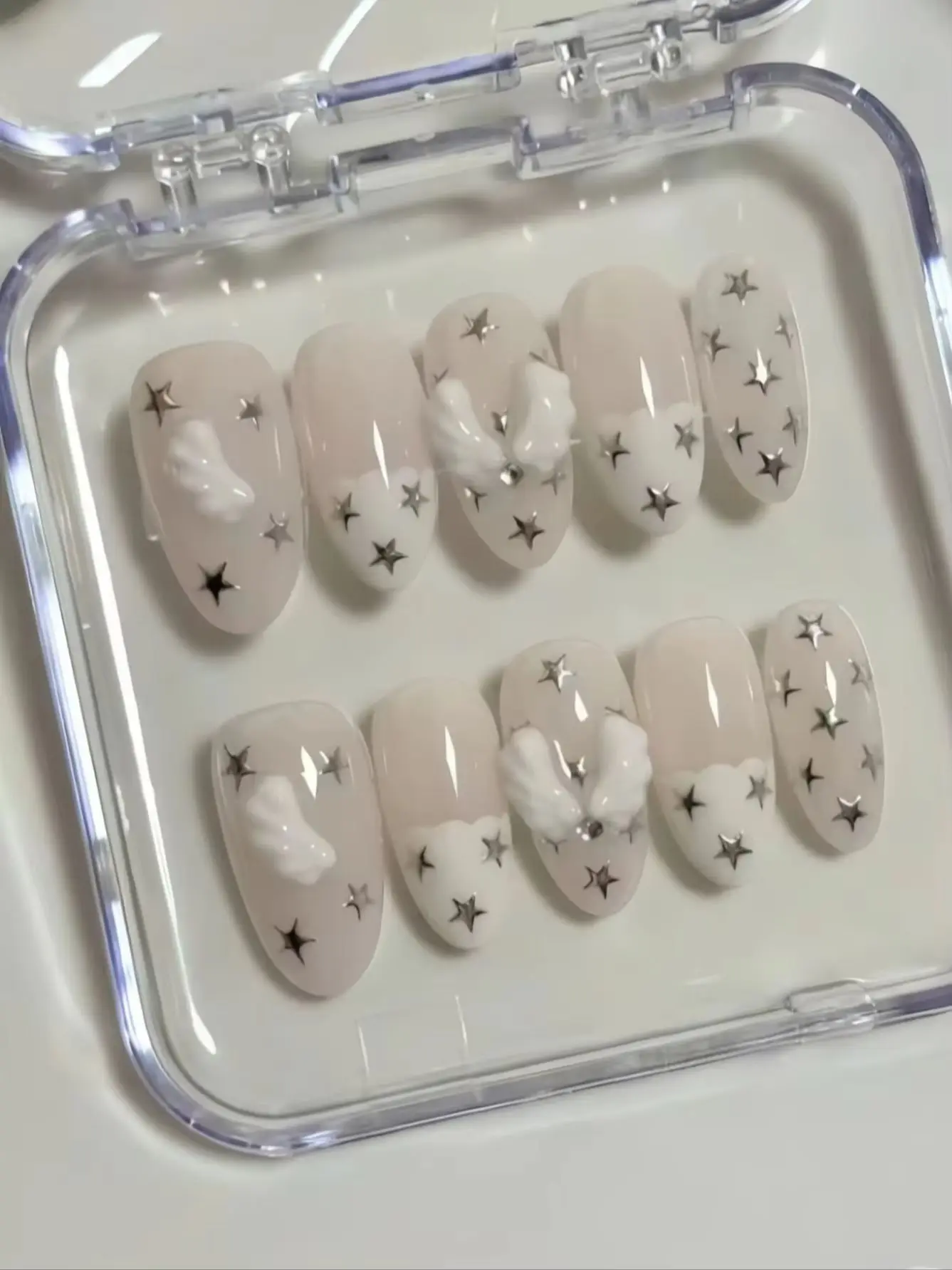 10-Piece Set of Cloud Wings and Silver Star Press-On Nails, Ice-Clear Nude Base Color, Clean and Transparent, Natural and Gentle