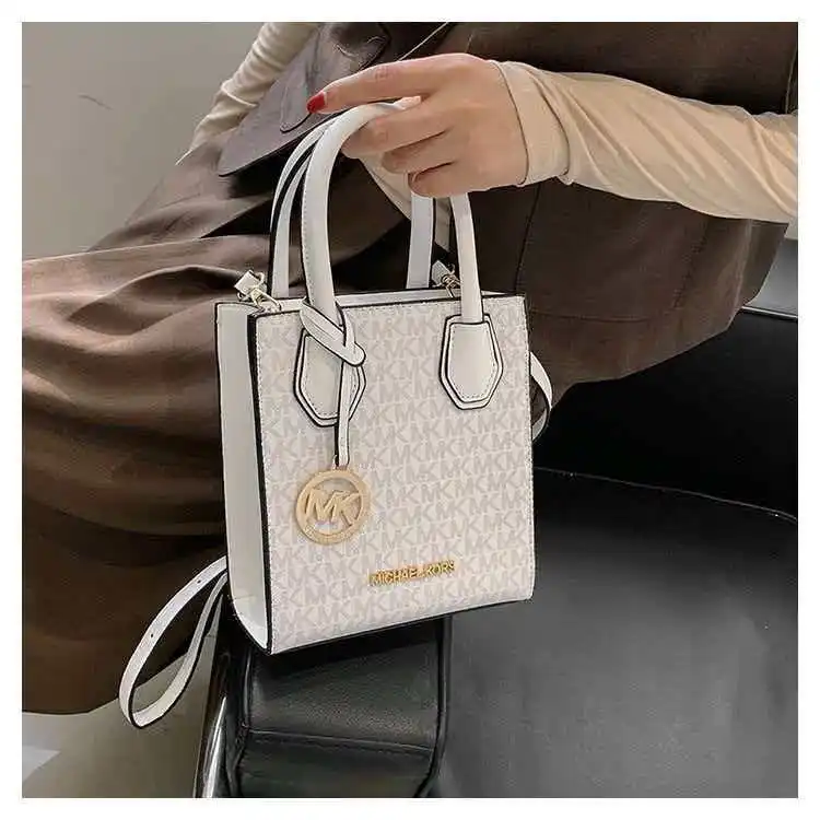 Michael Kors Mercer Mini PVC Leather Women's Handheld Crossbody Shopping Bag 2026 New Model, a Refined and Multifunctional Singl