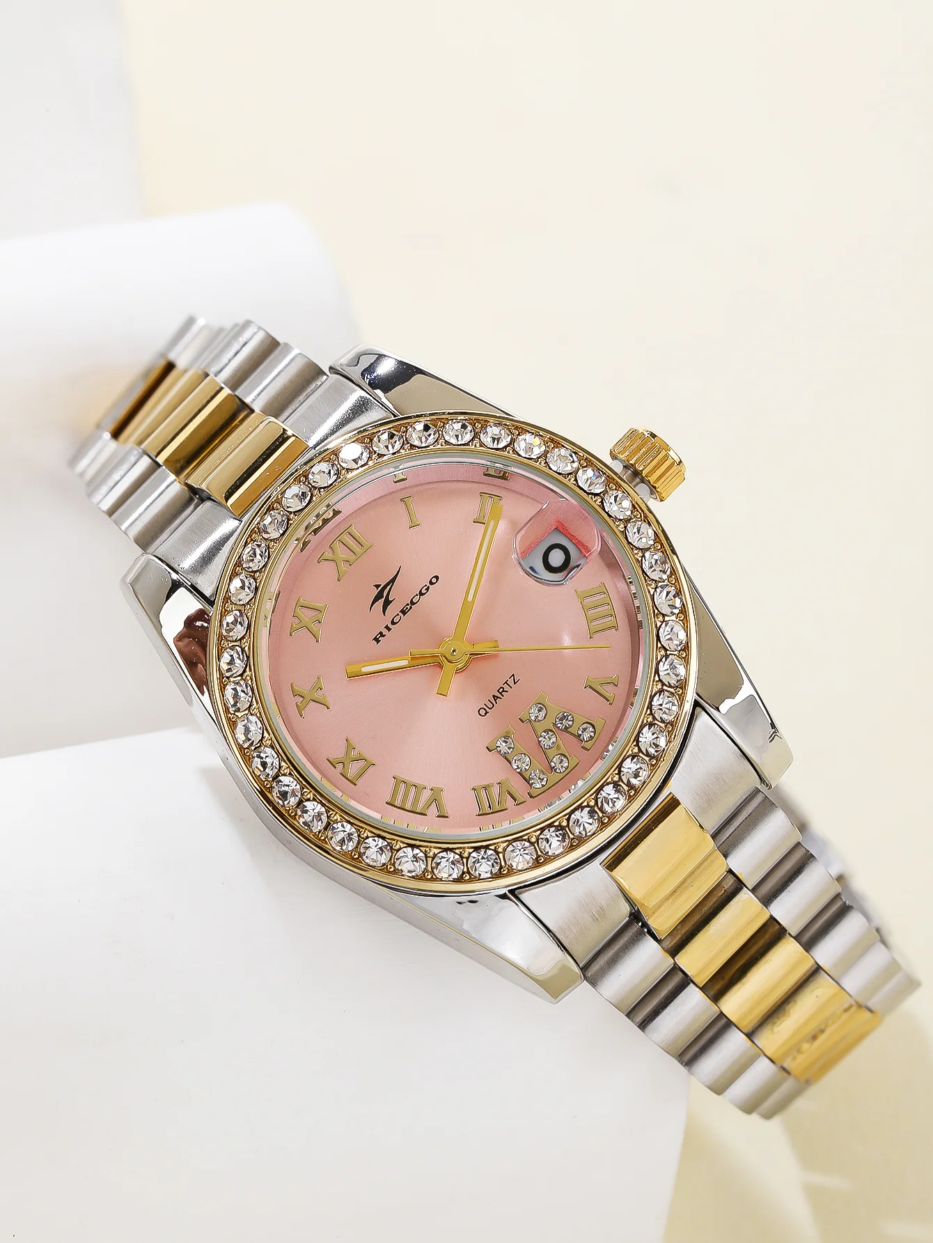 

Ladies' luxury quartz watch, dual tone stainless steel strap, rhinestone bezel, Roman numeral dial, date display watch