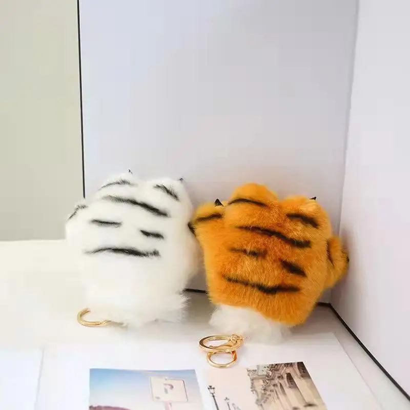 Portachiavi in peluche con zampa di tigre Peluche morbido e carino Portachiavi in peluche Ciondolo portatile con zampa di cartone animato Zaino in peluche Fascino decorativo per