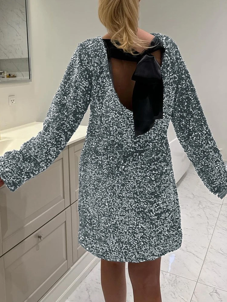

Fashion O-neck Long Sleeve Mini Dress Elegant Bow Backless Hollow Out Club Party Dress Women Sexy Shiny Sequin Solid Short Dress