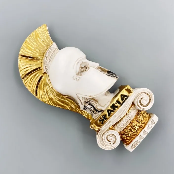 Greek cultural tourism souvenirs featuring three-dimensional Spartan warrior helmets and refrigerator stickers