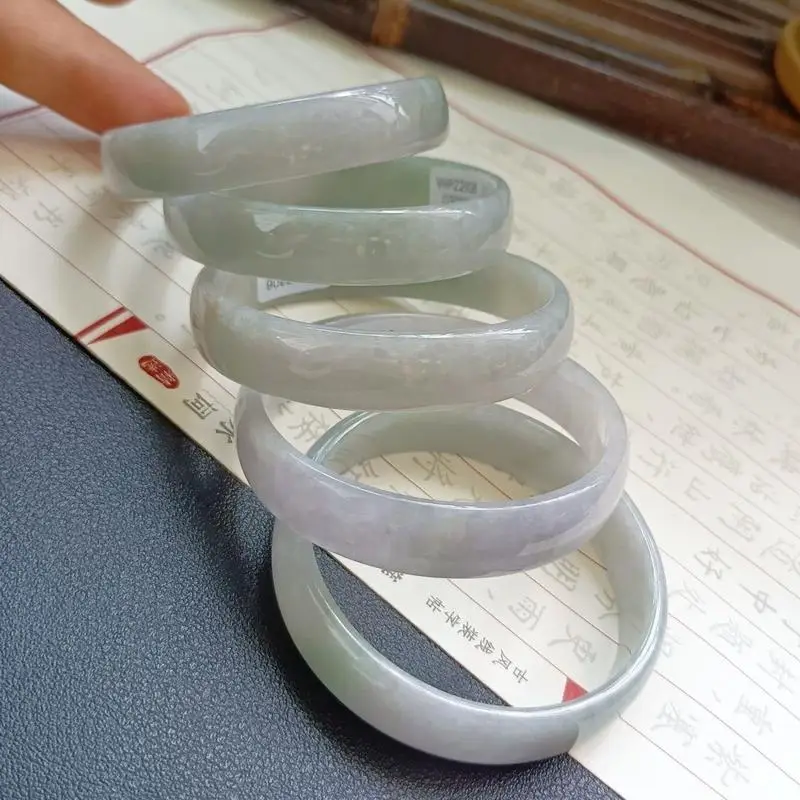 Jadeite bracelet, fine smooth texture, with a lustrous, icy, and grayish-purple hue