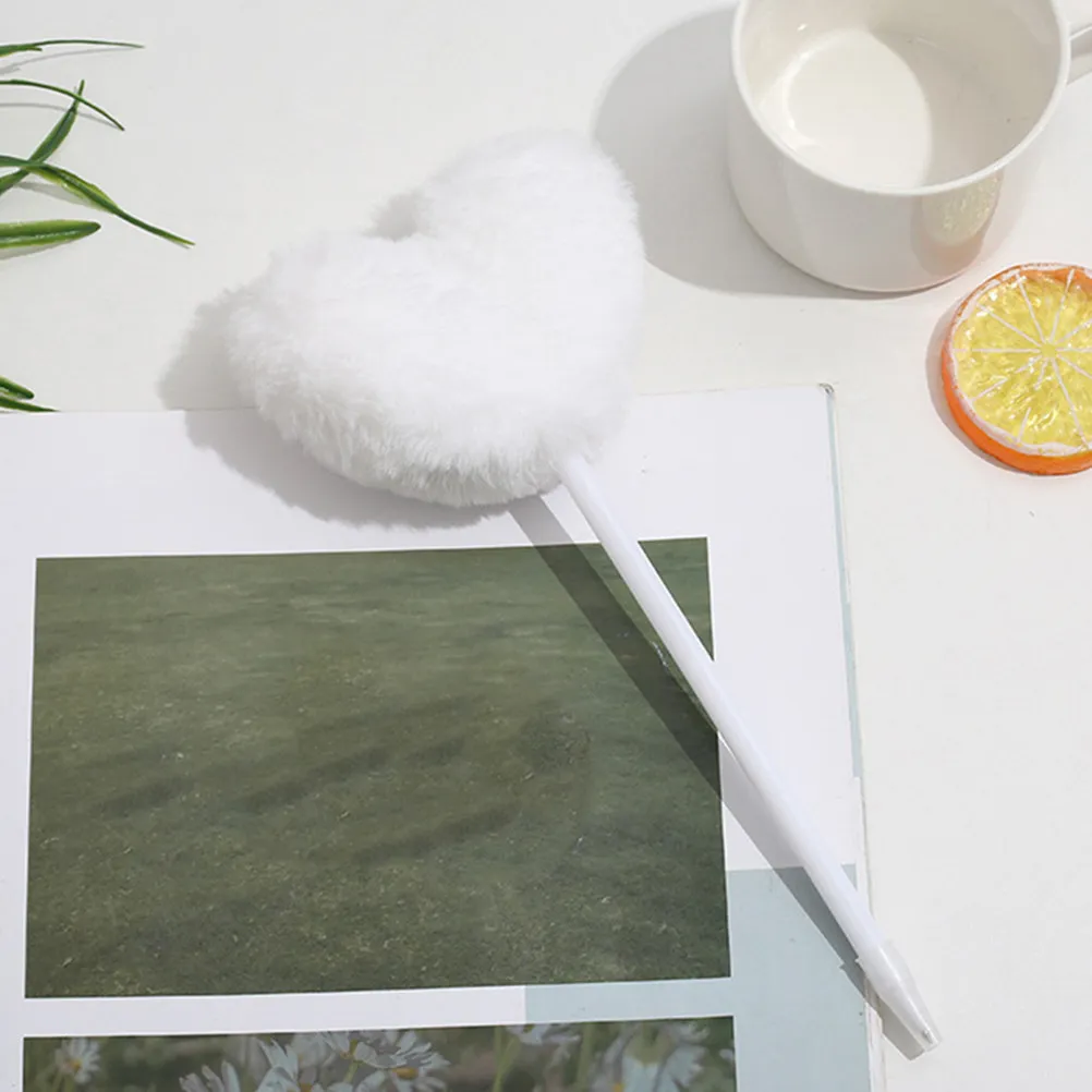 

7Pcs Decorative Heart Ballpoint Pens with Soft Pom Pom Topper Crisp Line Ergonomic Grip for Students Writing Enthusiasts