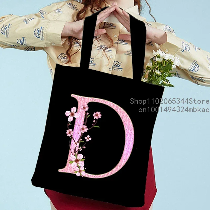 Damen-Sakura-Tasche, große Kapazität, Umhängetasche, Kirschblüten-Alphabet, lässig, Segeltuch, rosa Blumenmuster, Buchstabendruck, Teenager-Tragetasche