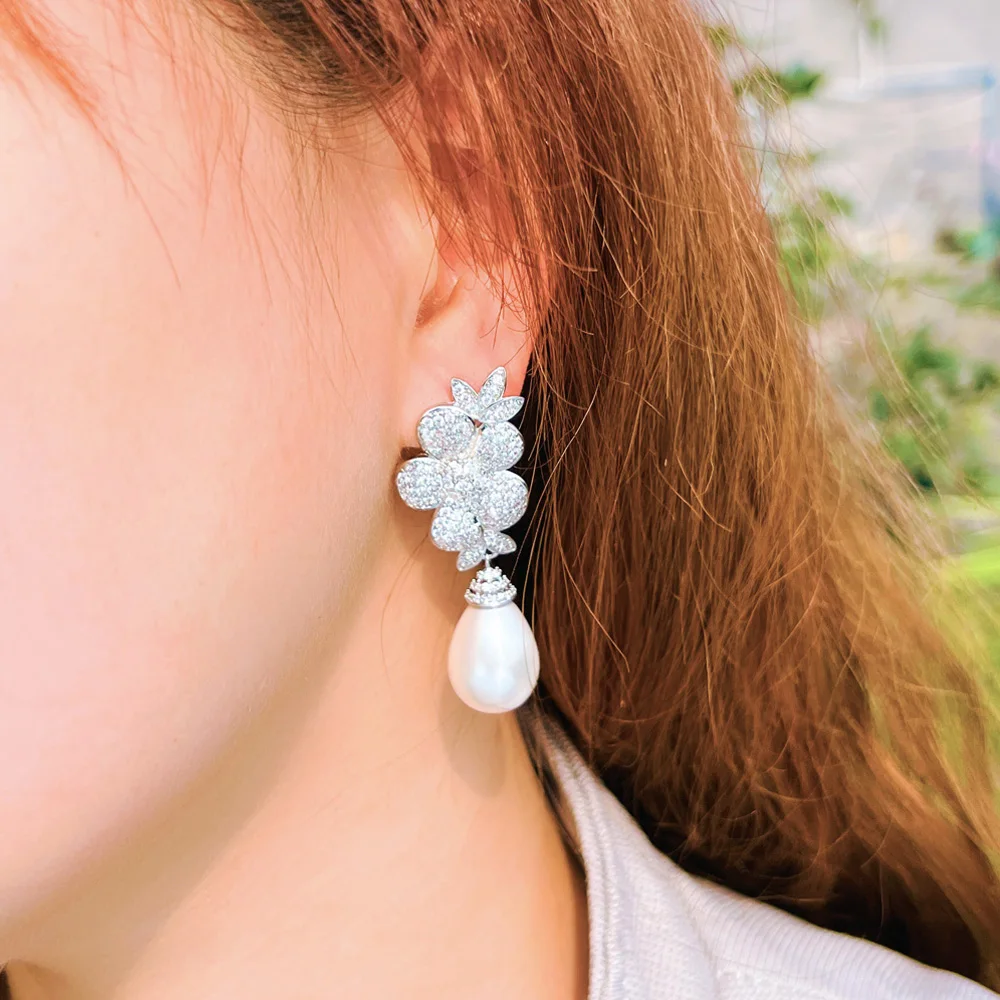 Pera-Boucles d'oreilles élégantes en or blanc pour femme, bijoux en forme de grande fleur, goutte d'eau, longue perle, mariage, fête, document cubique, E454