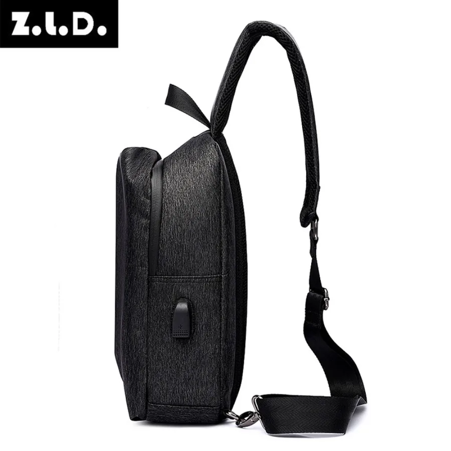 Side view of the messenger bag highlighting the external USB charging port
