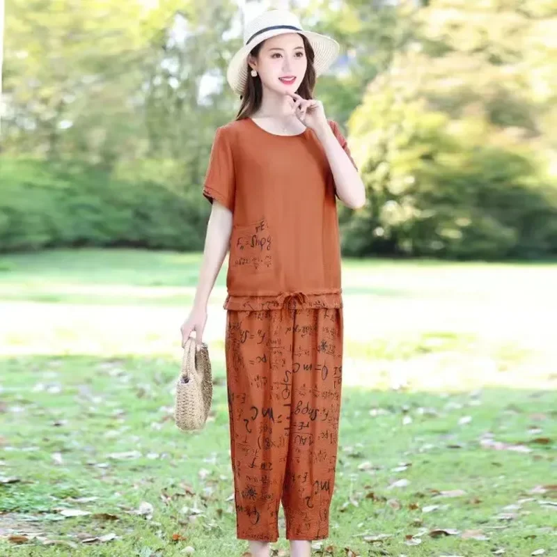 

Женская мода, повседневный свободный комплект из 2 предметов, лето 2025, новая одежда больших размеров, шифоновый костюм, длинное платье, топ, брюки Харлан, наряды