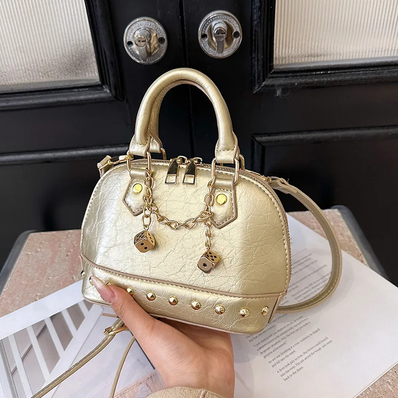 

2026 New Niche Design Fashion Women's Bag Winter High Texture Champagne Gold Rivet Handbag Fashionable Women's Messenger Bag