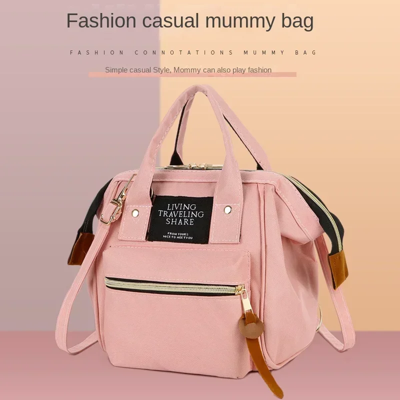 

Small-sized mother and baby storage bag, multifunction diaper backpack and handbag for travel, stroller accessory