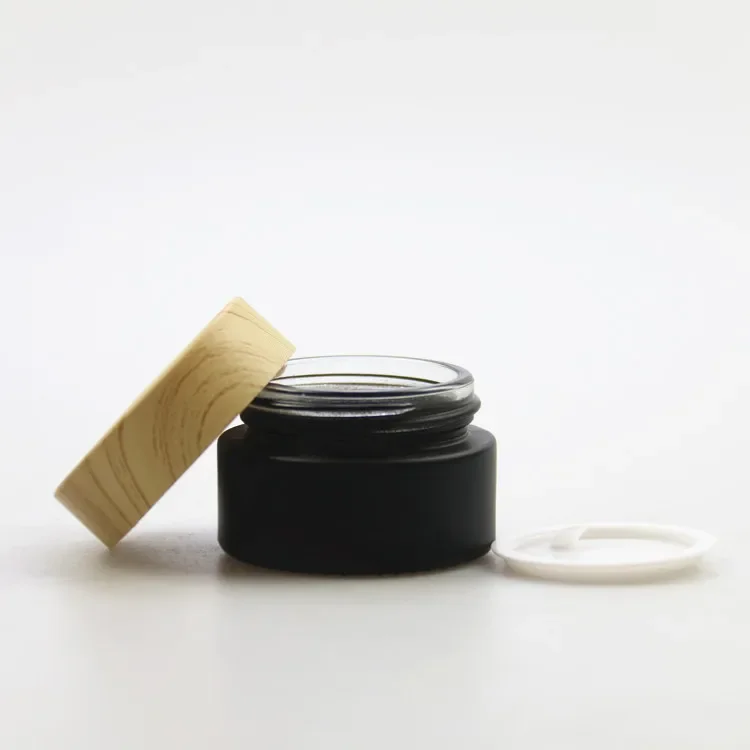 غطاء قطارة من الخيزران، زجاجة مصل زجاجية سوداء غير لامعة، زجاجة زجاجية غير لامعة، برطمان كريم زجاجي بلوري أسود مع غطاء حبوب خشبية بلاستيكية