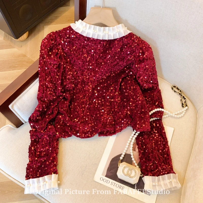 Moda High Sense czerwona aksamitna koszula z cekinami damski cienki płaszcz 2025 wiosna francuska wspaniała bluzka z długimi rękawami sweter Top Lady