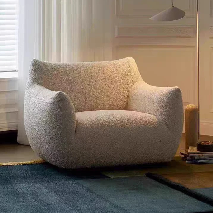 

A Single Fabric Sofa Made of Lamb Cashmere in the French Creamy Style, Suitable for the Living Room or Balcony of an Apartment.