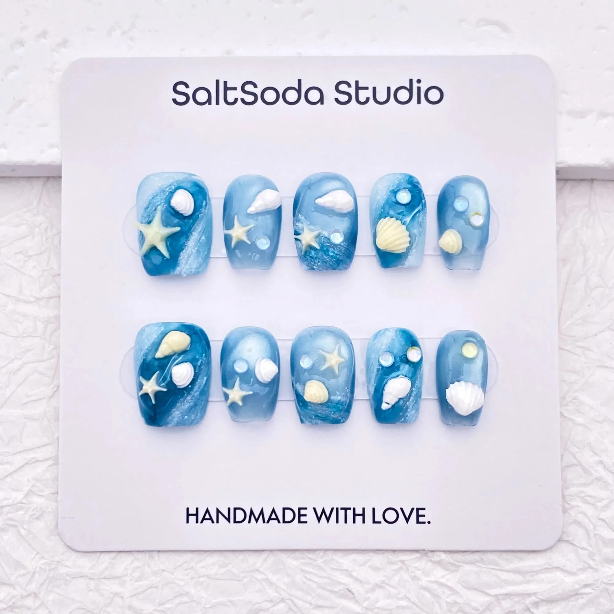 

3D starfish shell summer ocean gradient blue cat eye nail art, cute holiday style custom nail art, reusable high quality nails