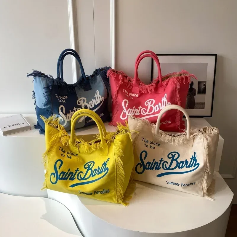 Bolso de hombro de lona para mujer, bolsa versátil de gran capacidad, diseño informal con borlas, gran oferta, 2024