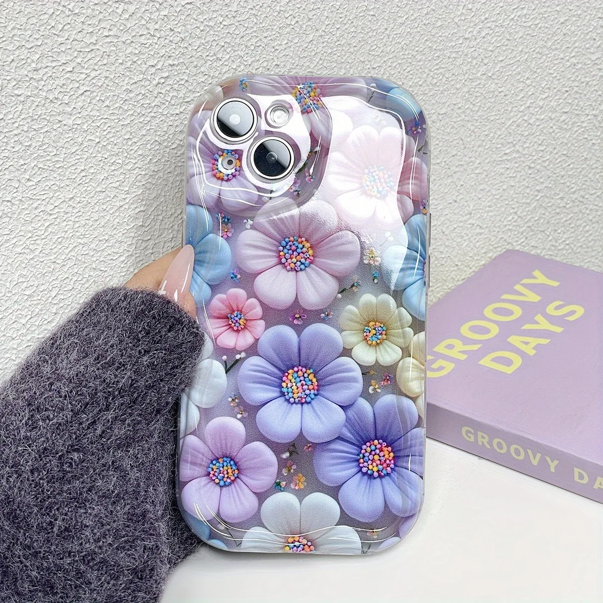 A stylish flower print phone case designed to fit iPhone 16, 15 Pro Max, 14Plus, 13, 12, 11 Pro Max series