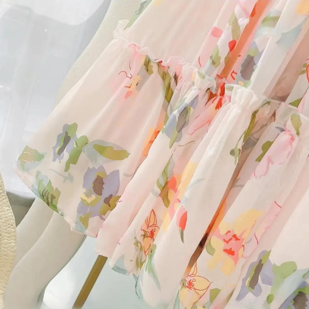 Versión coreana moda 4-13Y niña flor impresa princesa pastel vestido verano sin mangas gasa adolescentes playa vacaciones ropa