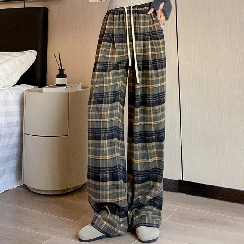 

Повседневные свободные брюки с широкими штанинами для женщин на осень и зиму, из ворсистой ткани, с завязками на талии, в клетку и с контрастными цветами.